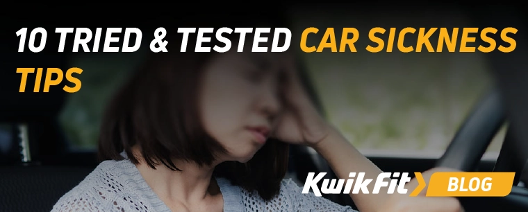 A driver holding their head for pain relief